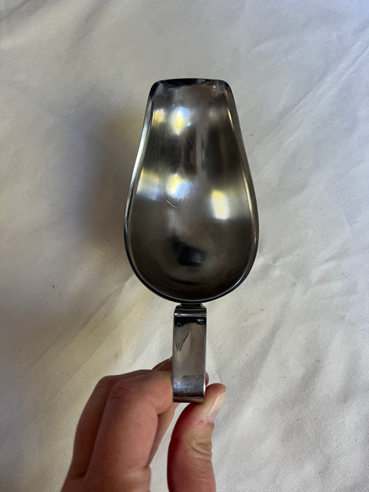 Bovenaanzicht vintage RVS juskom mid-century