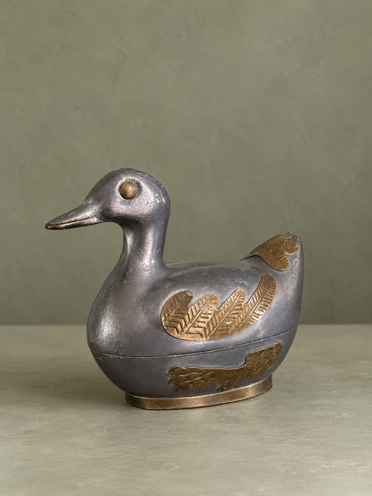 Vintage tinnen eend met messing decoratie